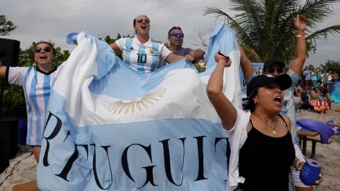 Argentina soccer fans react as their team beats France as they watch the game during the Haig Club’s Stadium in the Sand Ballyhoo Media World Cup watch party.
