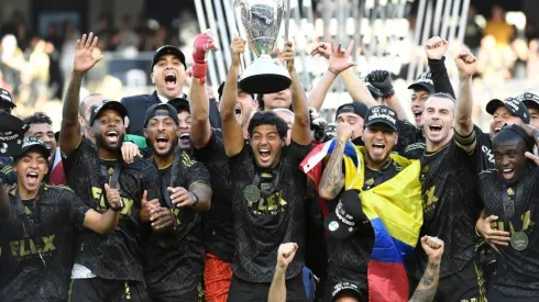 Carlos Vela of Los Angeles FC lifts the championship trophy