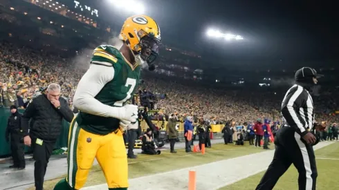 Quay Walker leaves the field after being disqualified against the Detroit Lions
