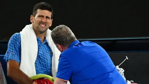 Novak Djokovic of Serbia receives attention during a medical time out
