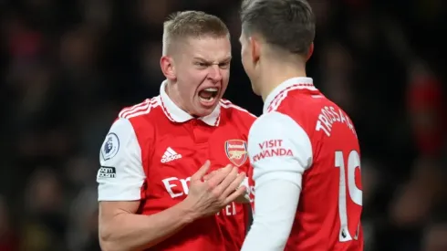 Oleksandr Zinchenko celebrates with Leandro Trossard of Arsenal
