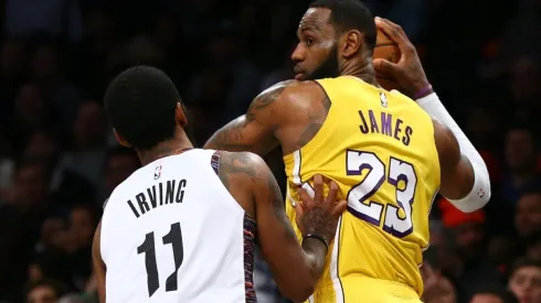 Kyrie Irving (left) and LeBron James.