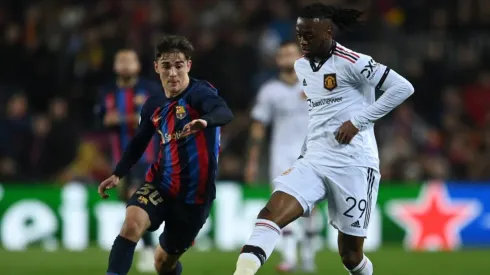 Gavi of FC Barcelona battles for possession with Aaron Wan-Bissaka of Manchester United
