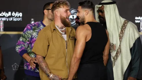 Jake Paul and Tommy Fury (R) clash during the Press Conference
