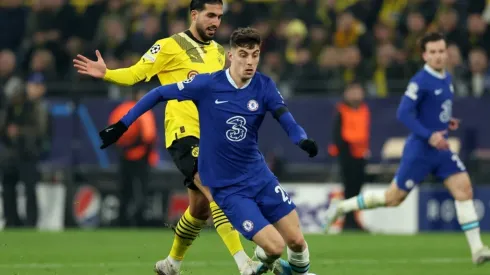 Emre Can of Dortmund challenges Kai Havertz of Chelsea
