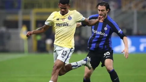 Galeno of FC Porto battles for possession with Matteo Darmian of FC Internazionale
