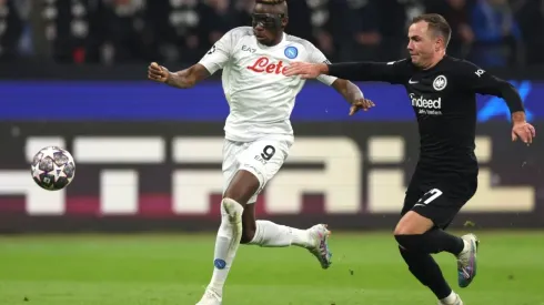 Victor Osimhen of SSC Napoli is challenged by Mario Goetze of Eintracht Frankfurt
