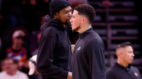 Kevin Durant (left) and Devin Booker.
