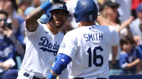 David Peralta #6 of the Los Angeles Dodgers celebrates the solo homerun of Will Smith #16
