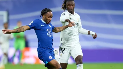 Raheem Sterling of Chelsea FC is challenged by Eduardo Camavinga of Real Madrid
