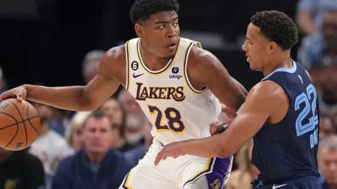 Rui Hachimura #28 of the Los Angeles Lakers handles the ball during the second half against Desmond Bane #22 of the Memphis Grizzlies