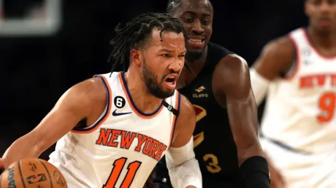 Jalen Brunson #11 of the New York Knicks drives to the basket as Caris LeVert #3 of the Cleveland Cavaliers defends
