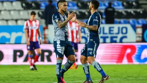 Cristian Arango (L) of Pachuca celebrates with Luis Chávez (R)
