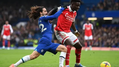 Bukayo Saka of Arsenal holds off Marc Cucurella of Chelsea
