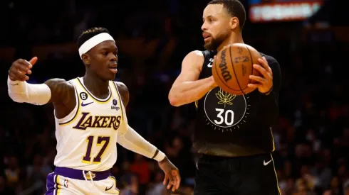 Stephen Curry #30 of the Golden State Warriors controls the ball against Dennis Schroder #17 of the Los Angeles Lakers
