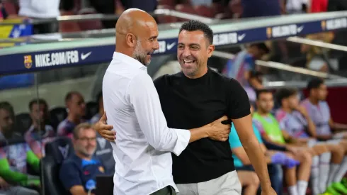 Pep Guardiola (left) and Xavi Hernandez.
