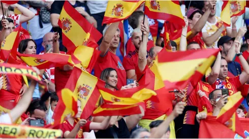 Spain fans wave flags
