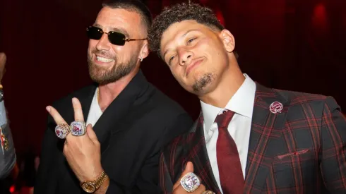 Kelce and Mahomes showing their Super Bowl rings