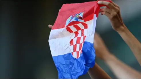 A fan waves a flag of Croatia
