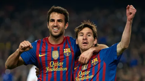 Lionel Messi with Cesc Fabregas playing for Barcelona
