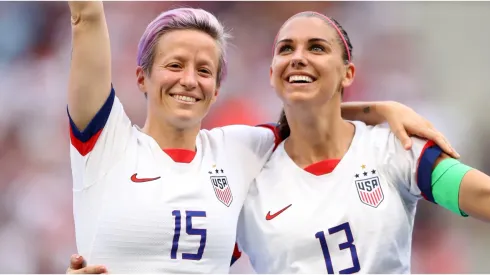 Megan Rapinoe of the USA celebrates with teammate Alex Morgan