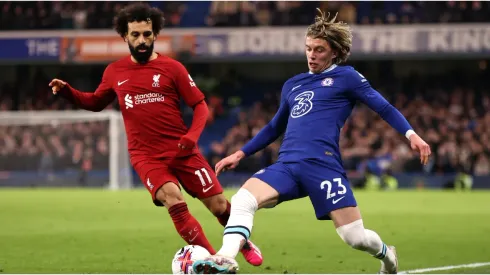Conor Gallagher of Chelsea battles for possession with Mohamed Salah of Liverpool
