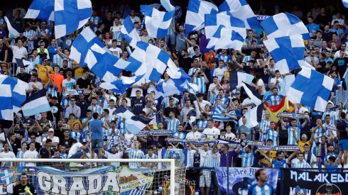 Málaga fans greet stranger at airport after club fails to make a single summer signing