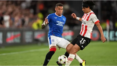 James Tavernier of Glasgow Rangers is tackled by Erick Gutierrez of PSV Eindhoven
