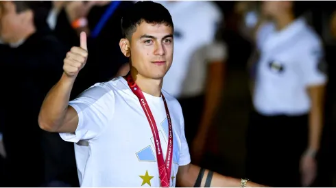 Paulo Dybala greets the fans during the arrival of the Argentina men's national soccer team