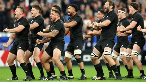 Sam Cane of the All Blacks and team mates perform the Haka during the Rugby World Cup
