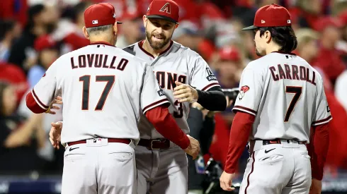 Manager Torey Lovullo #17 greets Evan Longoria #3 of the Arizona Diamondbacks