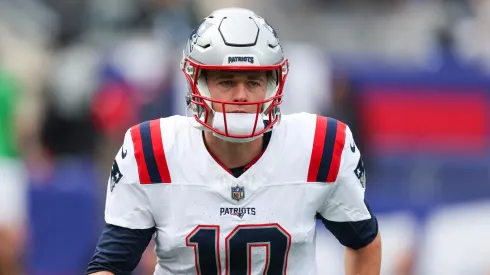 Mac Jones of the New England Patriots looks on prior to the game against the New York Giants.
