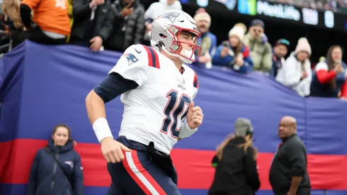 Mac Jones takes the field prior to the game against the New York Giants.