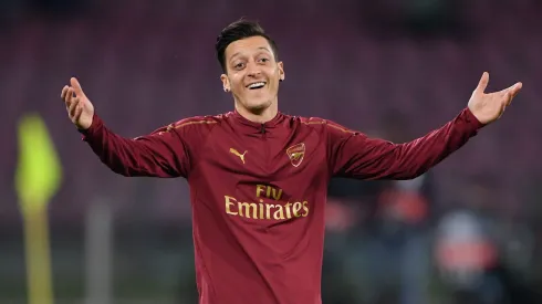 Mesut Özil of Arsenal gestures during warm up prior to the UEFA Europa League Quarter Final Second Leg match between S.S.C. Napoli and Arsenal at Stadio San Paolo on April 18, 2019 in Naples, Italy.
