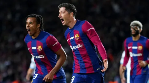 Robert Lewandowski of FC Barcelona celebrates after scoring their team's first goal during the LaLiga EA Sports match between FC Barcelona and Girona FC at Estadi Olimpic Lluis Companys on December 10, 2023 in Barcelona, Spain.
