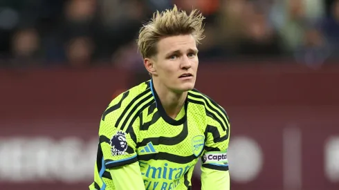 Martin Odegaard of Arsenal reacts during the Premier League match between Aston Villa and Arsenal FC at Villa Park on December 09, 2023 in Birmingham, England. 
