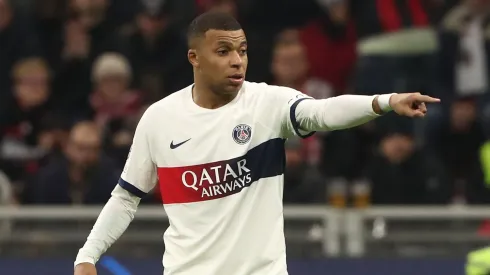 Kylian Mbappe gestures during the UEFA Champions League match between AC Milan and Paris Saint-Germain.
