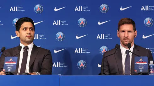 Lionel Messi answers journalists with President Nasser Al Khelaifi during a conference of Paris Saint-Germain at Parc des Princes on August 11, 2021 in Paris, France.
