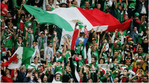 Mexican fans perform a Mexican wave
