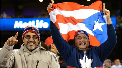 Fans of Team Puerto Rico waves the Puerto Rican Flag
