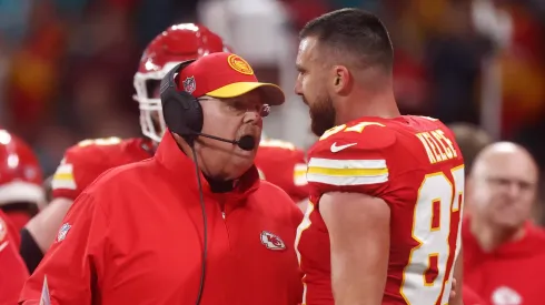 Head coach Andy Reid of the Kansas City Chiefs speaks with Travis Kelce #87 during the NFL match between Miami Dolphins and Kansas City Chiefs at Deutsche Bank Park on November 05, 2023 in Frankfurt am Main, Germany.
