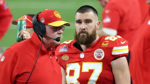 Travis Kelce #87 and Head coach Andy Reid of the Kansas City Chiefs look on in the second quarter against the San Francisco 49ers during Super Bowl LVIII at Allegiant Stadium on February 11, 2024 in Las Vegas, Nevada.
