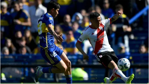  Esequiel Barco of River Plate fights for the ball with Jorman Campuzano of Boca Juniors
