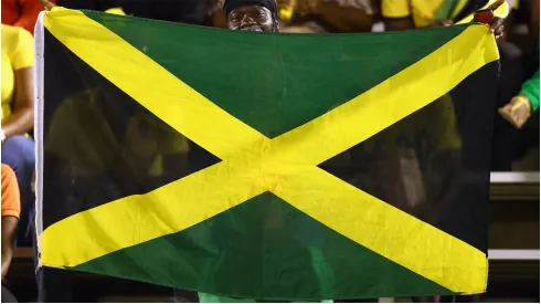 A fan waves a Jamaica flag