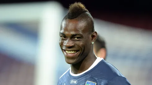 Mario Balotelli of Italy smiles during a training session on October 14, 2013 in Naples, Italy. (Photo by Claudio Villa/Getty Images)