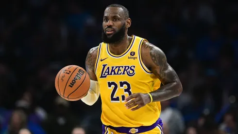 LeBron James carries the ball during a Lakers game.
