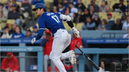 Los Angeles Dodgers star Shohei Ohtani runs to first base after a getting a hit.
