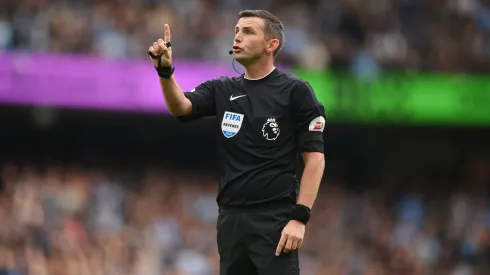 Match official Michael Oliver looks on during the Premier League match between Manchester City and Manchester United at Etihad Stadium on October 02, 2022 in Manchester, England.
