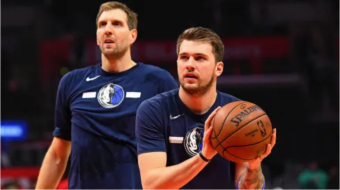 Dirk Nowitzki and Luka Doncic during a Dallas Mavericks practice
