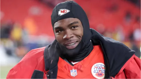 Kansas City Chiefs wide receiver Rashee Rice gives an on-field interview after a game.
